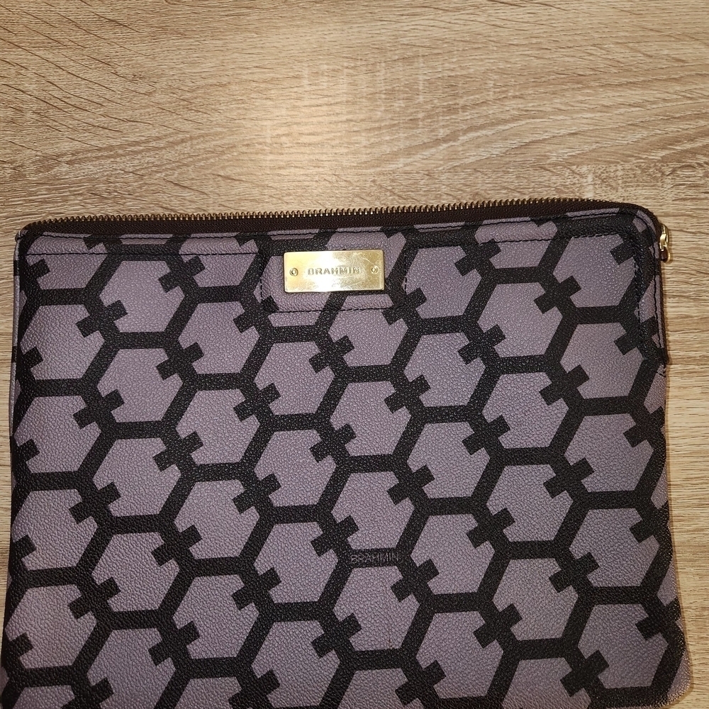 Brahmin brand clutch with a purple hexagonal pattern
